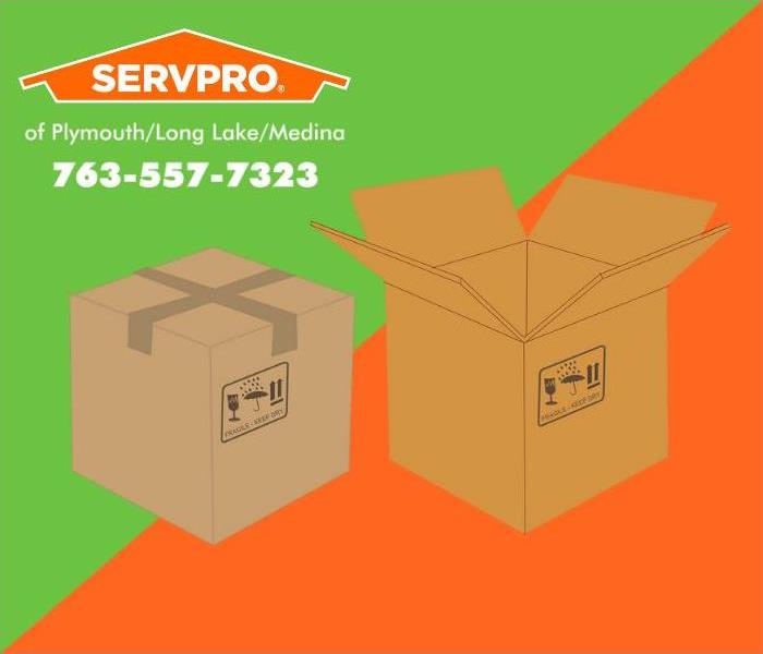 Two Cardboard moving boxes with an orange and green background.